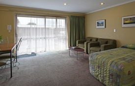 Comfortable couch and single bed in the living room