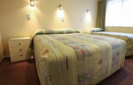 Main bedroom has a queen-size bed and a single bed