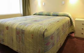 Access Unit has queen-size bed in the room