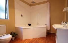 Studio room has double corner spa bath